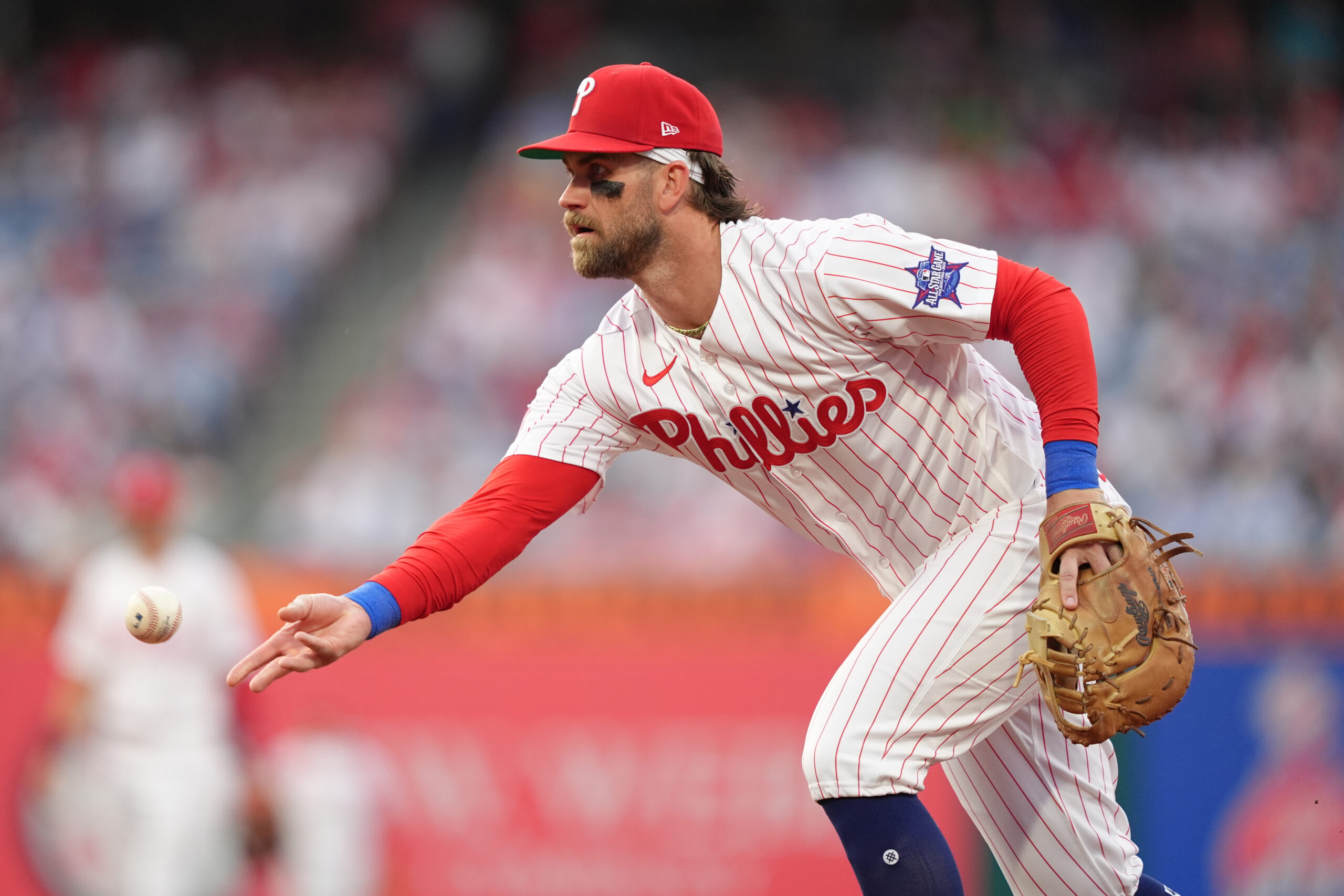 Bryce Harper has tough night at first base as Phillies fall to Chase Burns, Reds
